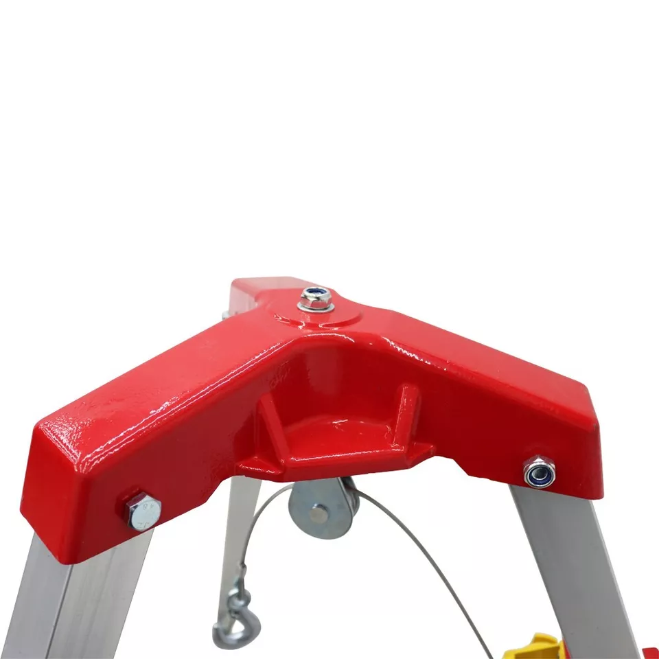 Close-up of the red tripod head and pulley beneath it